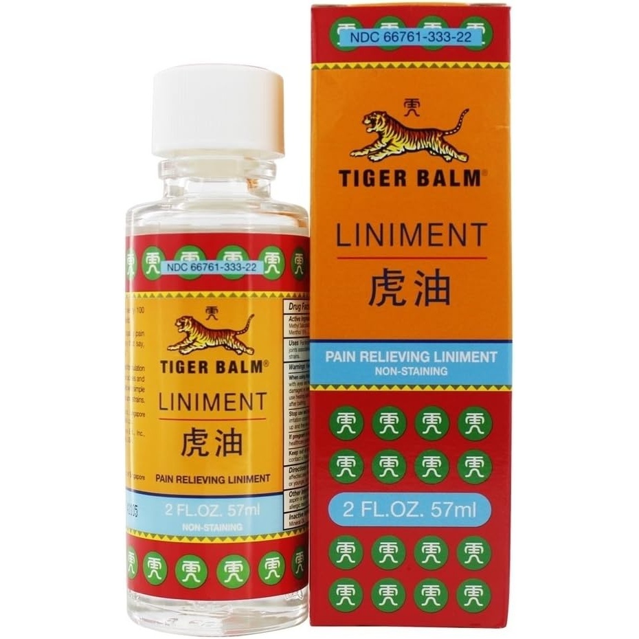 image:imageTiger Balm Liniment 2 oz  Sore Muscle and Joint Relief Liniment Oil  Arthritis and Back Relieving Oil  Topical Joint Discomfort Relief